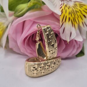 ARETES HUGGIES LARGOS ESTRELLAS